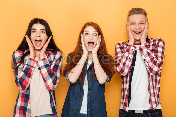 Group of happy school friends screaming Stock photo © deandrobot