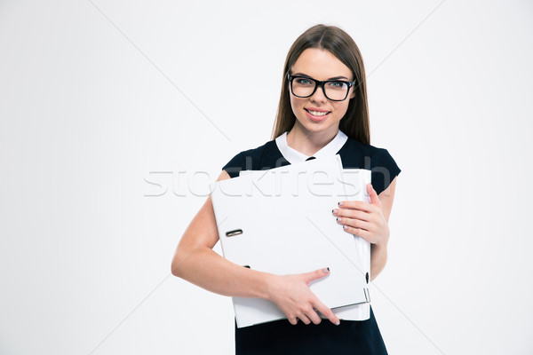 Happy female student holding folders Stock photo © deandrobot