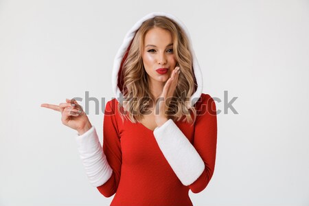 Young angry woman looking at camera Stock photo © deandrobot