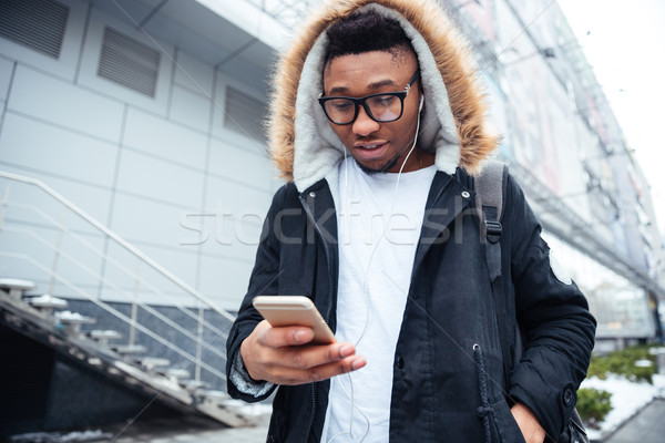 年輕 非洲的 男子 手機 商業照片 © deandrobot