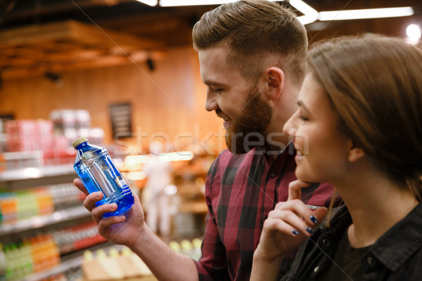 Stockfoto: Vrolijk · liefhebbend · paar · supermarkt · kiezen · water