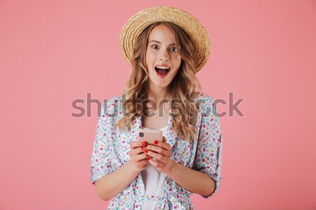 Shocked lady with cola and popcorn wearing 3d glasses Stock photo © deandrobot