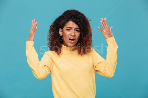 Stock photo: Displeased young african woman