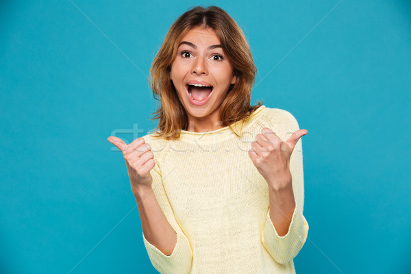 Stockfoto: Opgewonden · gelukkig · jonge · glimlachende · vrouw · tonen
