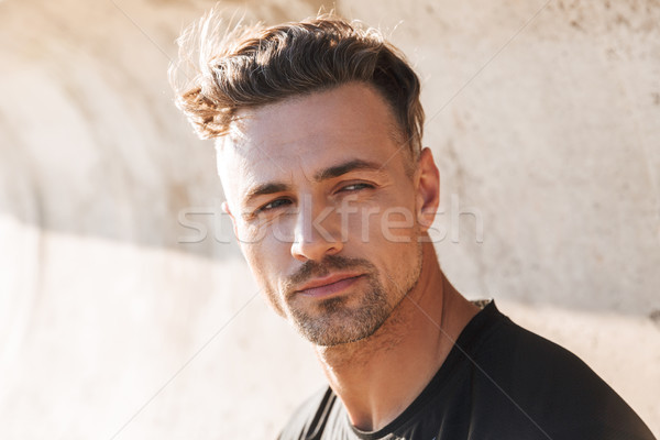 Stock photo: Close up portrait of a handsome young man