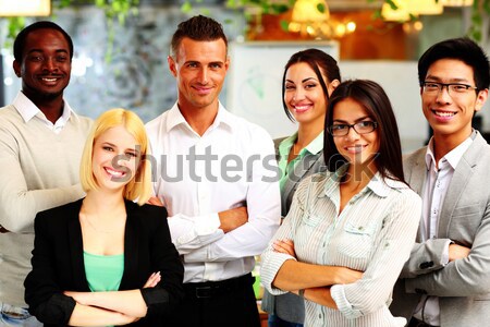 Portrait of a smiling group business people Stock photo © deandrobot