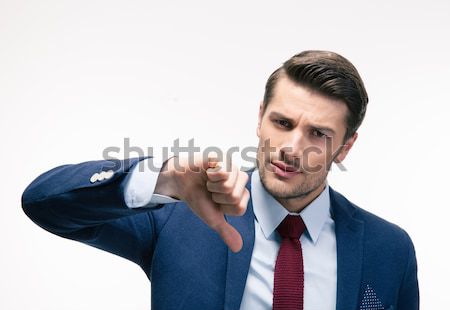 Businessman showing thumb down sign Stock photo © deandrobot