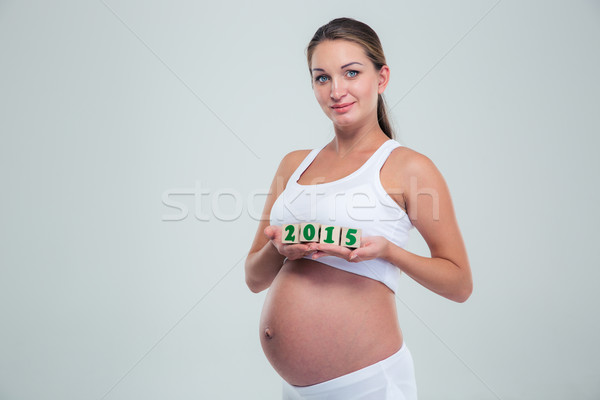 Foto stock: Mujer · embarazada · número · ladrillos · retrato · aislado