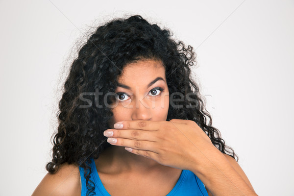 Afro amerikai nő befogja száját portré izolált Stock fotó © deandrobot