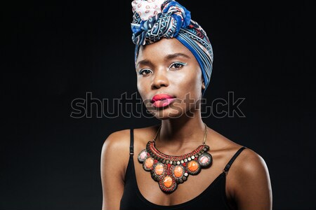 Close-up portrait of attractive woman with hand on lips Stock photo © deandrobot