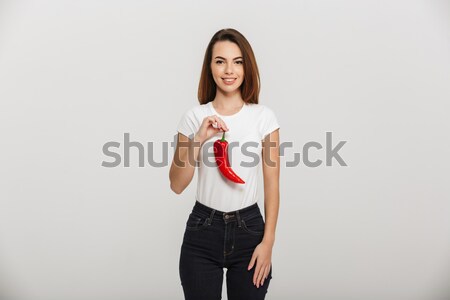 Close up portrait of tender brunette young woman touching face Stock photo © deandrobot