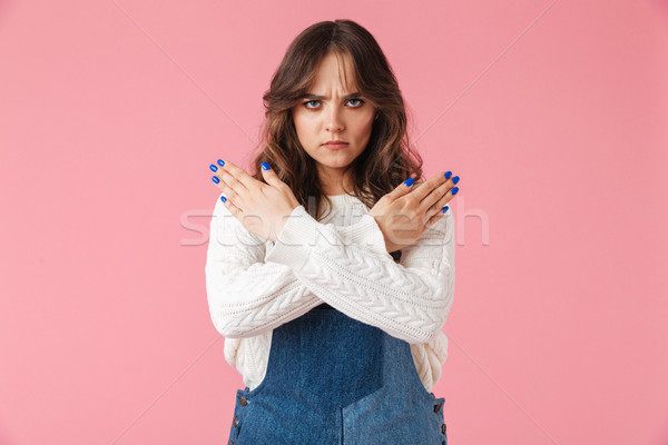 Retrato grave joven manos signo Foto stock © deandrobot