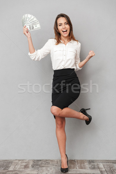 [[stock_photo]]: Excité · jeunes · femme · d'affaires · gagnant · geste