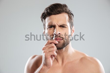Beauty portrait of half naked attractive young man Stock photo © deandrobot