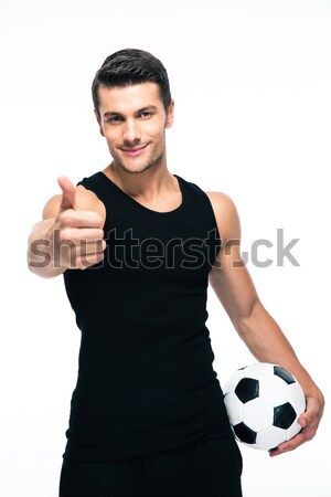 Man with soccer ball showing thumb up sign Stock photo © deandrobot