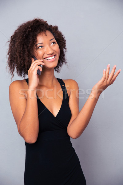 Stock photo: Afro american woman talking on the phone