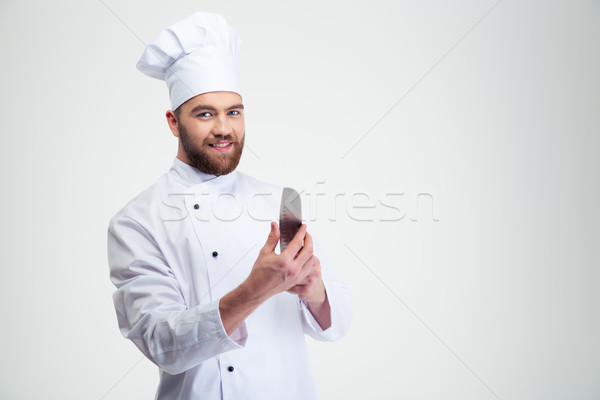 Lächelnd Küchenchef Koch halten Messer Porträt Stock foto © deandrobot