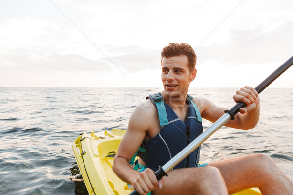 Сток-фото: красивый · мужчина · озеро · морем · лодка · изображение
