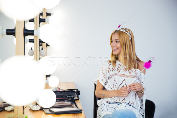 Woman with queen crown and magic wand Stock photo © deandrobot