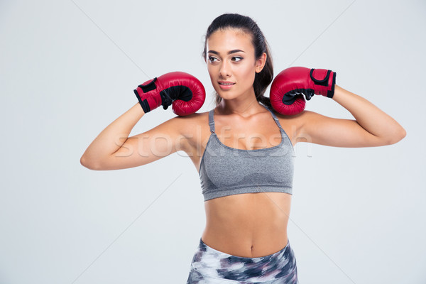 Portrait of a beautiful fitness woman  Stock photo © deandrobot