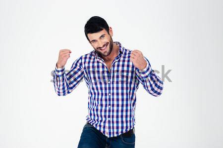 Happy casual man celebrating his success Stock photo © deandrobot