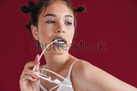 Csinos modell eszik csokoládé krém alsónemű Stock fotó © deandrobot