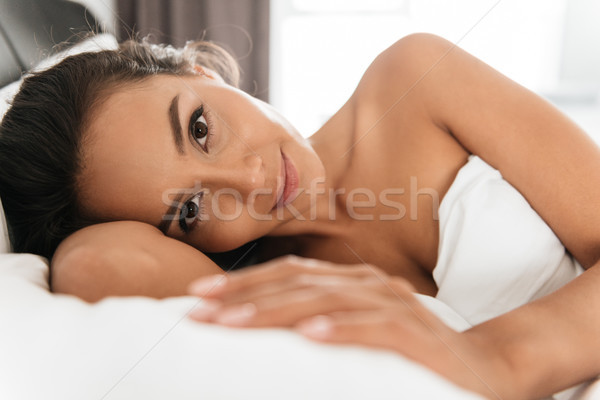 Close up portrait of a young smiling asian woman Stock photo © deandrobot