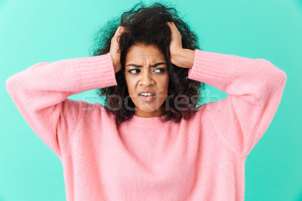 Image closeup of distressed woman with headache grabbing head an Stock photo © deandrobot