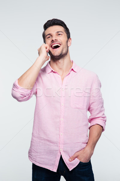 Businessman talking on the phone Stock photo © deandrobot
