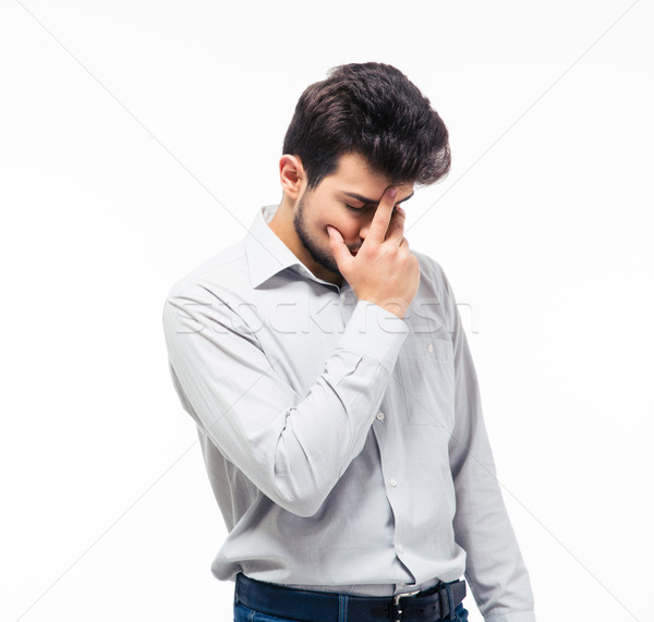 Upset young man covering his face Stock photo © deandrobot