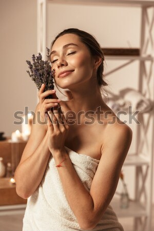 Seductive sensual young woman in corset and black lace stockings  Stock photo © deandrobot