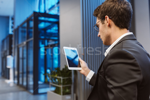 Stock photo: Back view of Business man with laptop computer