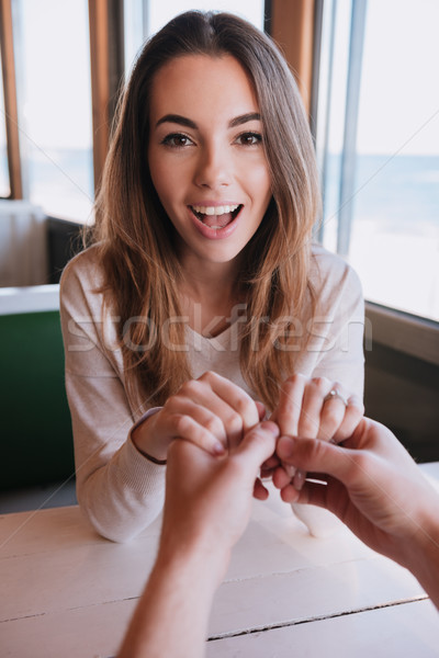 Vertical image heureux femme date mains tenant [[stock_photo]] © deandrobot