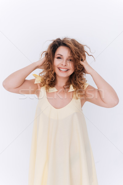 Vertical image of woman in singlet Stock photo © deandrobot