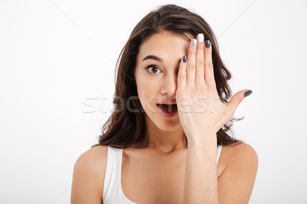 Close up portrait of a pretty girl dressed in tank-top Stock photo © deandrobot