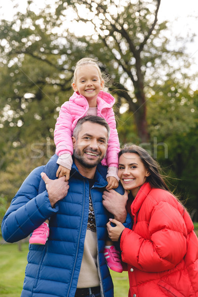 Beautiful young family spending time together Stock photo © deandrobot