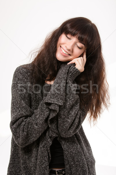 Happy woman standing with closed eyes Stock photo © deandrobot