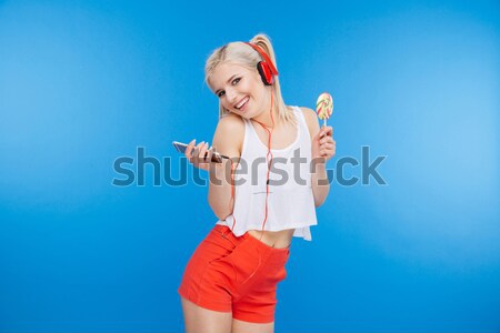 Charmant blonde vrouw lolly Blauw vrouw Stockfoto © deandrobot