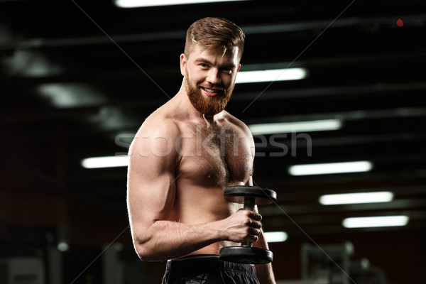 Feliz deportes hombre deporte pesas Foto stock © deandrobot