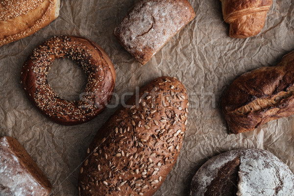 Pastries and bread with flour on table Stock photo © deandrobot