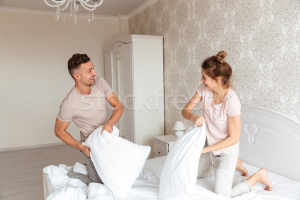 Afbeelding blijde paar samen bed Stockfoto © deandrobot