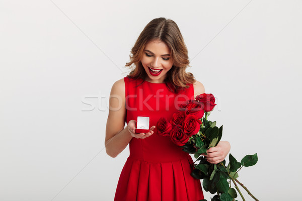 Retrato sorridente mulher jovem vestido vermelho Foto stock © deandrobot