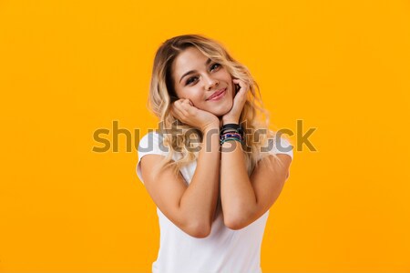 Portrait of a smiling pretty girl in black dress Stock photo © deandrobot