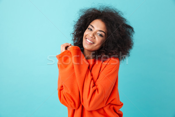 Colorful portrait of african american woman in red shirt with af Stock photo © deandrobot