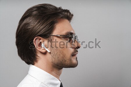 Yakışıklı ciddi adam güneş gözlüğü beyaz gözler Stok fotoğraf © deandrobot