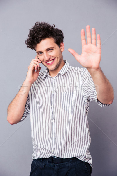 微笑 男子 說 電話 年輕人 顯示 商業照片 © deandrobot
