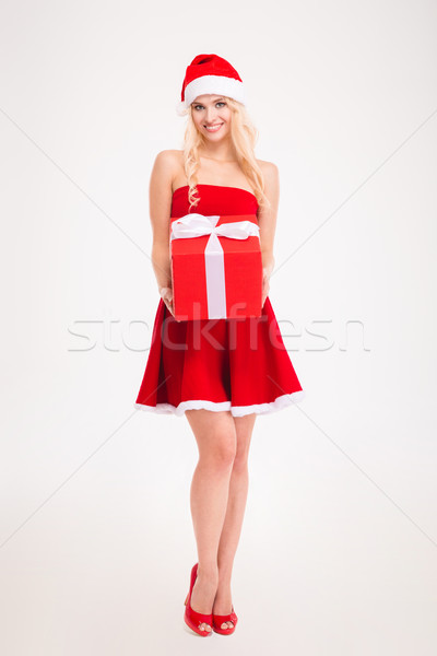 Mulher jovem vermelho papai noel vestir seis Foto stock © deandrobot