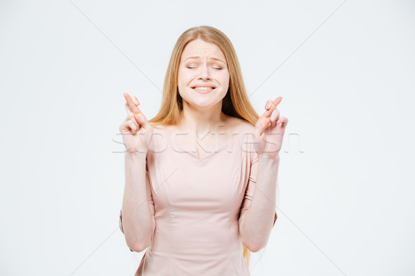 Woman with crossed Stock photo © deandrobot