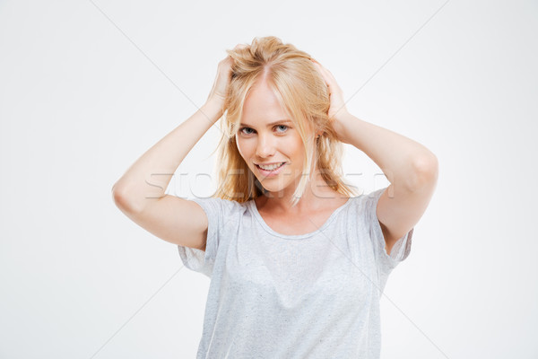 Portrait of happy beautiful young woman with blonde hair Stock photo © deandrobot