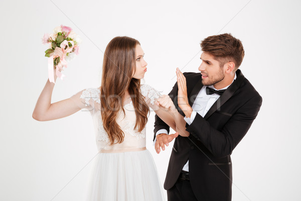 Conflict cuplu buchet alb mâini dragoste Imagine de stoc © deandrobot